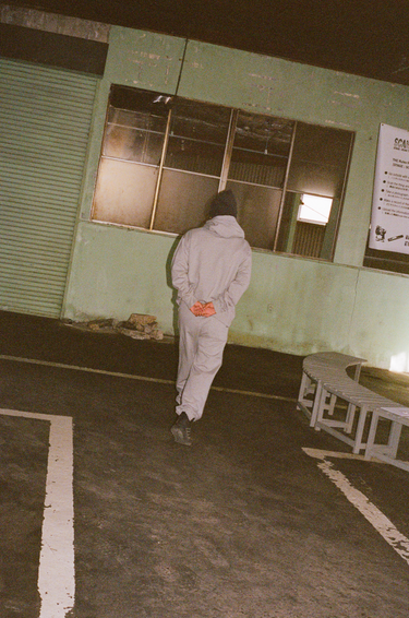 Shinjiro wearing vowels Classic Hoodie in Heather